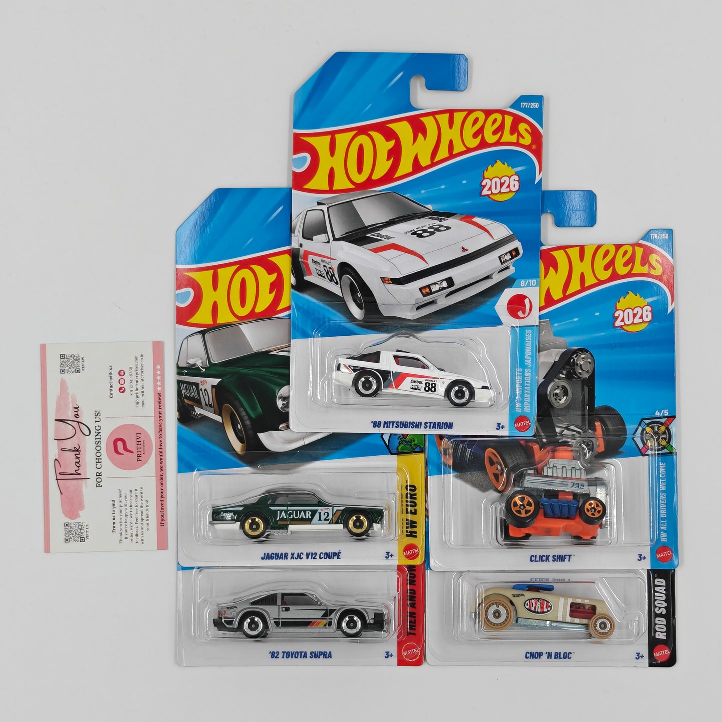 '88 Mitsubishi Starion, Jaguar XJC V12 Coupe, '82 Toyota Supra, Click Shift & Chop 'N Bloc by Mattel – Hot Wheels 5-Car Bundle