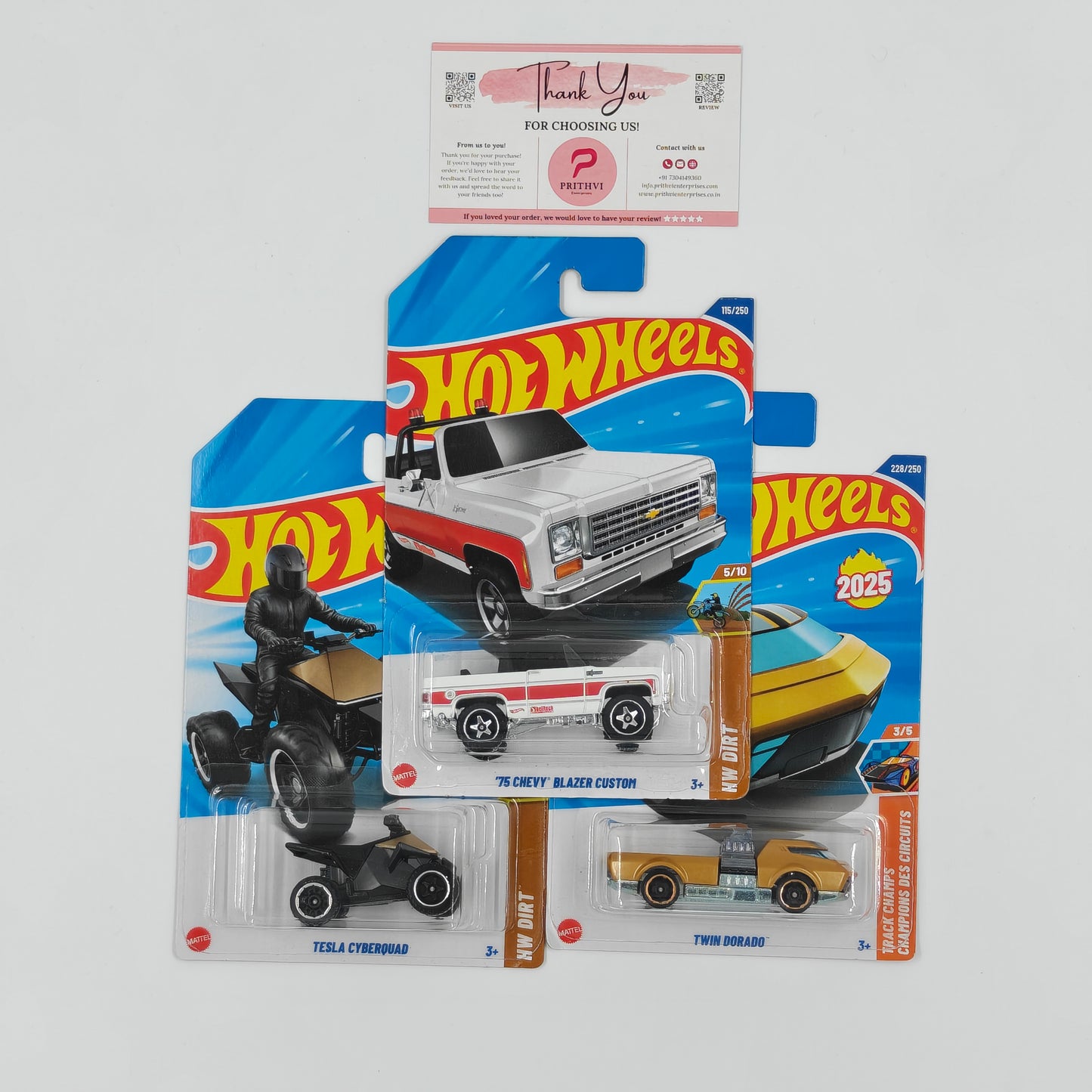 Hot Wheels Bundle – Tesla Cyberquad, '75 Chevy Blazer Custom & Twin Dorado by Mattel