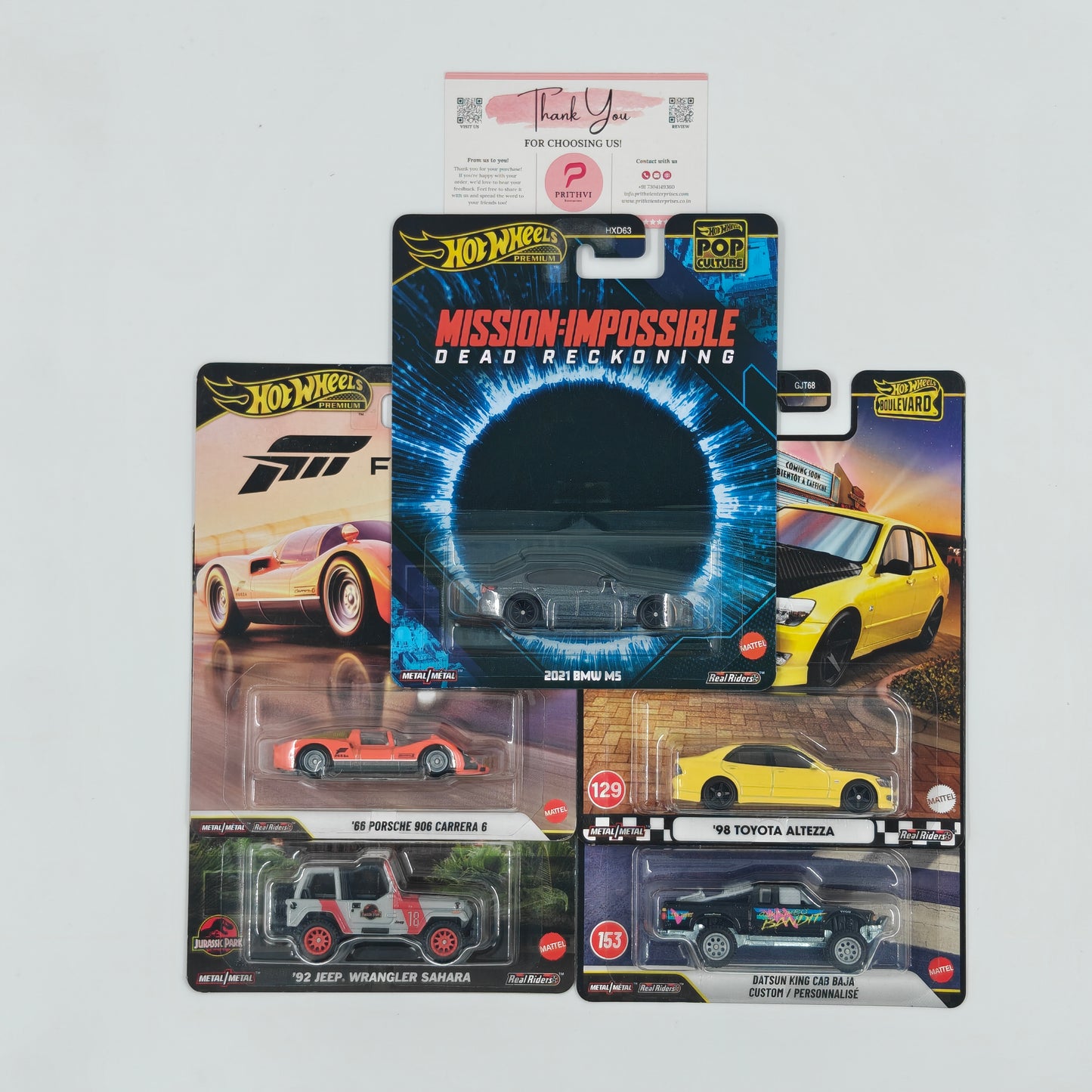 2021 BMW M5 (Mission: Impossible – Dead Reckoning), '66 Porsche 906 Carrera 6 (Forza), '98 Toyota Altezza, '92 Jeep Wrangler Sahara (Jurassic Park) & Datsun King Cab Baja Custom / Personnalisé by Mattel – Hot Wheels Premium Bundle
