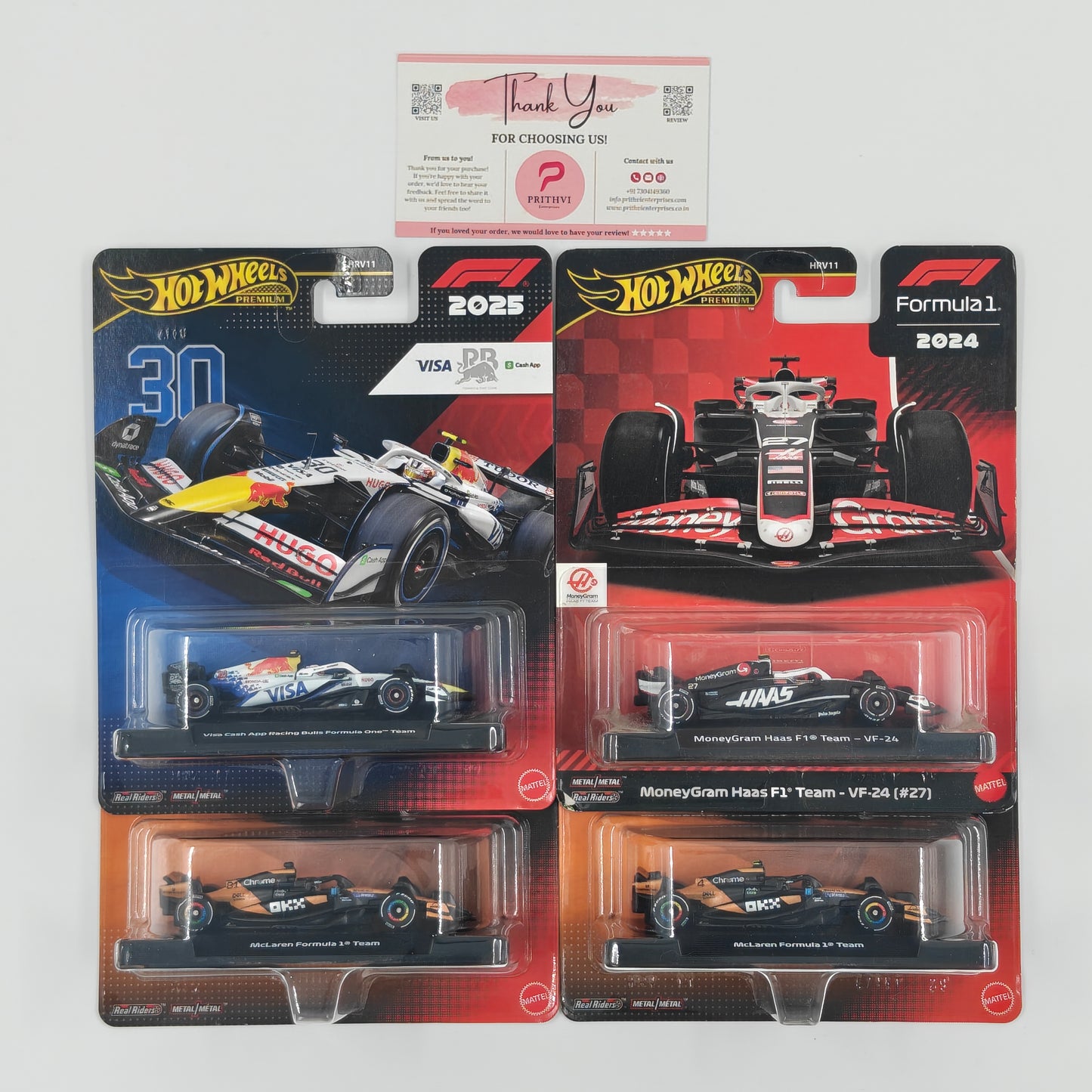 Visa Cash App Racing Bulls Formula One Team, MoneyGram Haas F1 Team – VF-24 (#27), McLaren Formula 1 Team & McLaren Formula 1 Team (2nd) by Mattel – Hot Wheels Premium Bundle